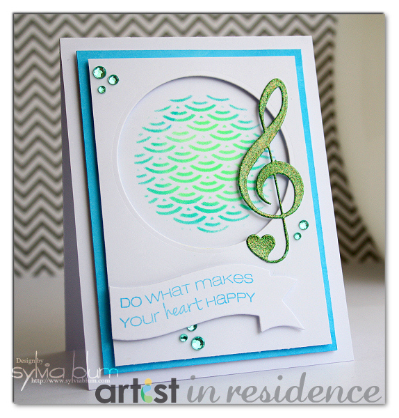 Handmade card featuring blue and green Radiant Neon inks stenciled on in a wave pattern by Sylvia Blum.