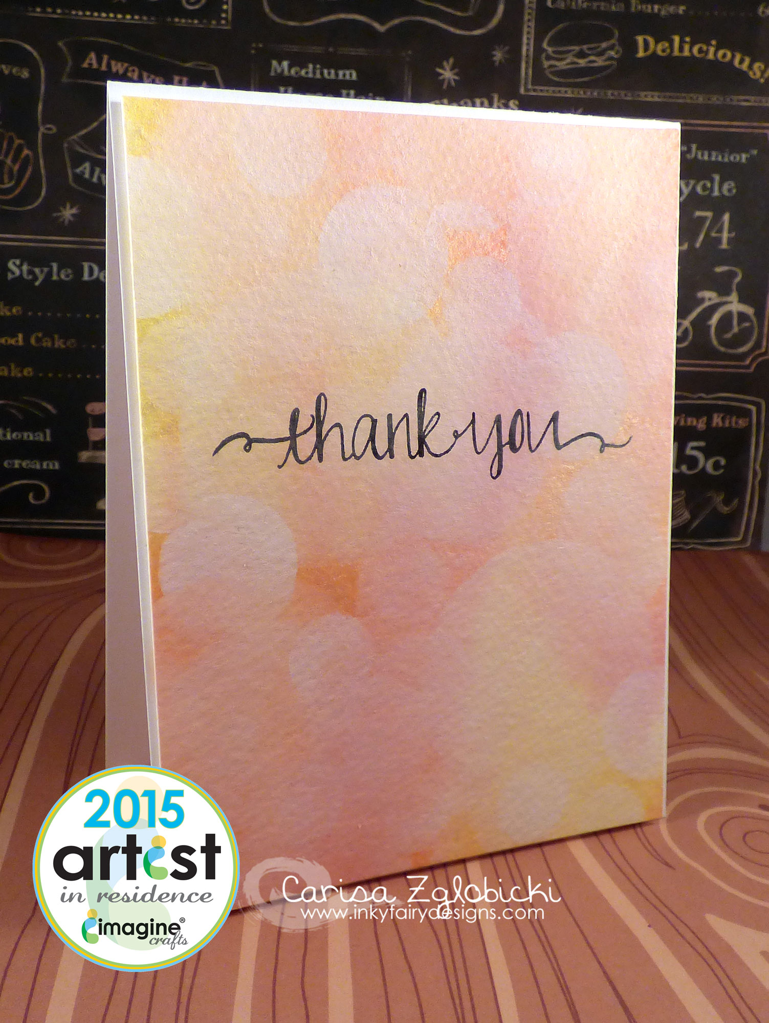 Handmade thank you card featuring a bokeh effect made with inks in yellows, oranges and coral colors.