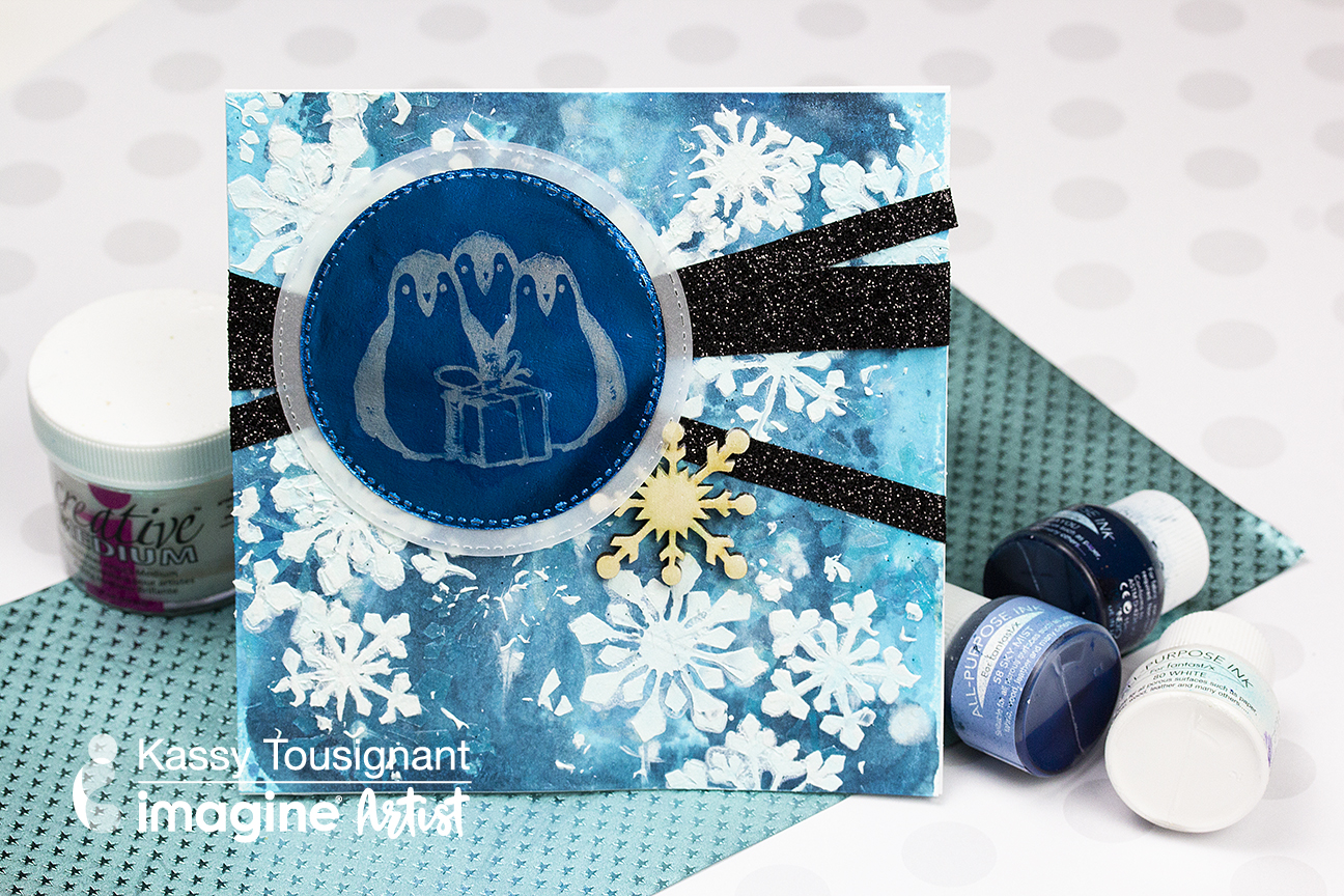 A handmade mixed media style holiday card featuring a penguin image and blue colors.