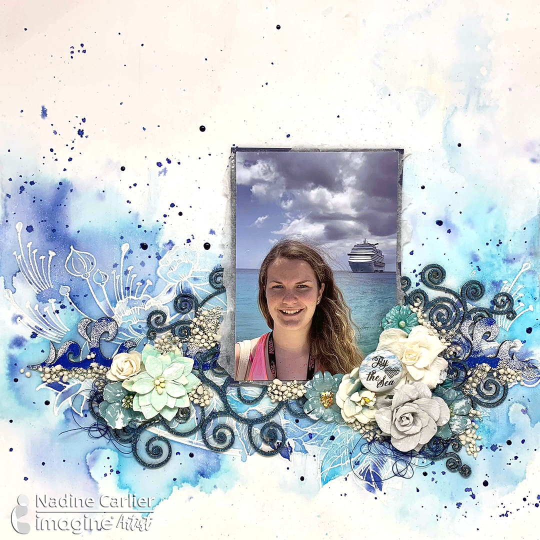 Handmade scrapbook layout featuring blue tones made with Fireworks shimmery craft sprays.